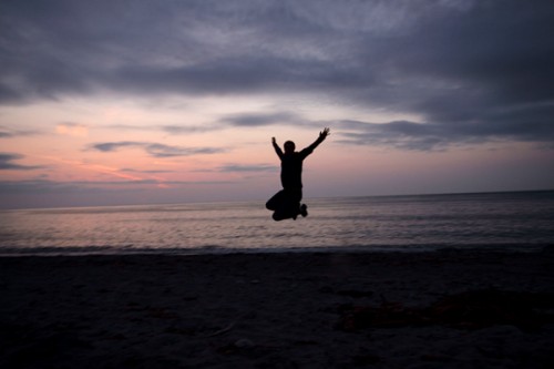 jumping at the beach