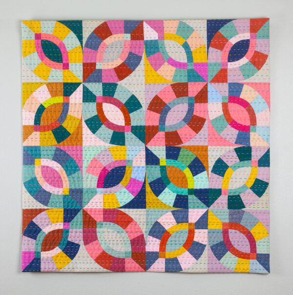 hand pieced colorful quilt